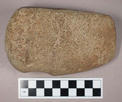 Ground stone, grooved axe with flat base and rounded end