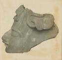 Sculpted stone face
