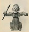 Ceramic figurine holding spear