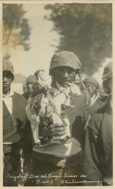 Man holding figurine