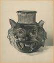 Ceramic vessel with animal face