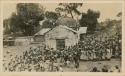 Large crowd worshipping Maximón