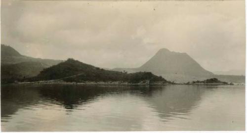 View of shoreline, with Cerro de Oro in background