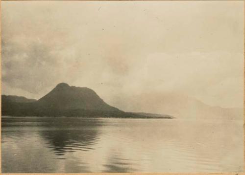 View of shoreline, with Cerro de Oro in background