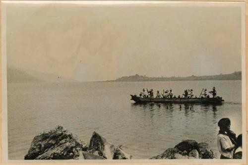 Men in boat on lake