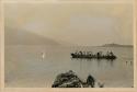 Men in boat on lake