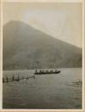 Men in boat on lake