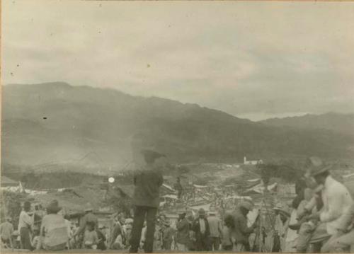 Large group on hillside, with Esquipulas in background