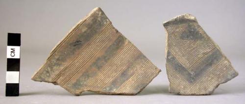 3 incised and graphite painted sherds