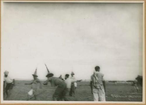 Ngobe-Bugle throwing sharpened balsa poles at opponents' ankles during Balseria