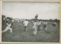 Ngobe-Bugle throwing sharpened balsa poles at opponents' ankles during Balseria