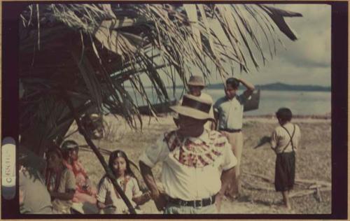 Ngobe-Bugle site at mouth of the Cricamola River, man wearing hate and elaborate beaded collar