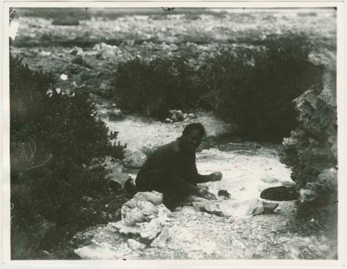 Woman washing clothes