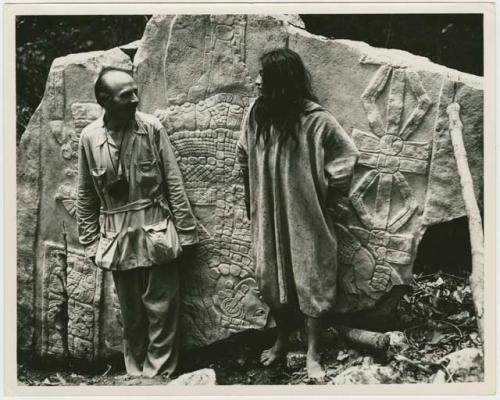 Giles Greville Healey (left) and Kayom Carranza (right) standing before Stela 1 fragment at Bonampak