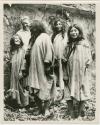 J. Eric S. Thompson with four Lacandon people at Bonampak