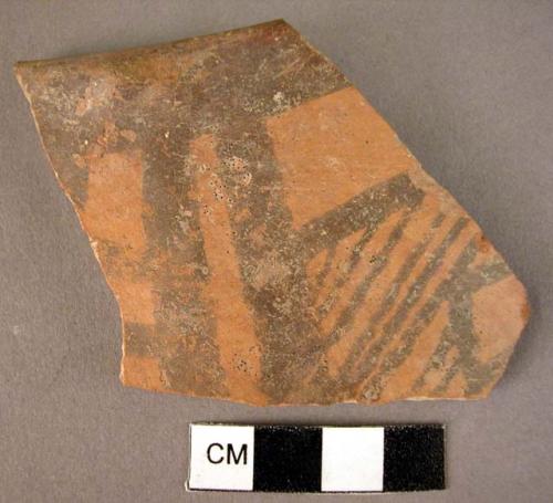 Rim potsherd - black on red, Dimini style (Wace & Thompson, 1912, Types B3#2 or