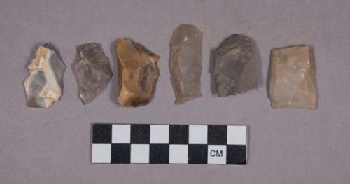 Flint flakes, chipping debris, and blades