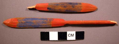 Carving, wood paddles, blue & red band design, broken