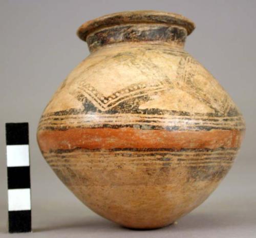 Pottery jar, base red, upper zone white with black ornamentation