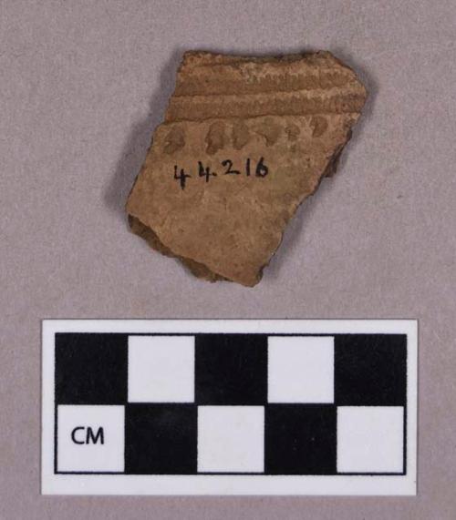 Ceramic, earthenware body sherd, grit-tempered, dentate decorated
