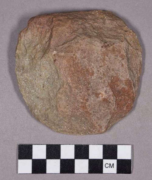 Ground stone, modified lithic, circular