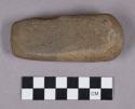 Ground stone, modified lithic, chisel-shaped stone with pecked base and tip