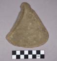 Ground stone, modified lithic, triangular-shaped thin stone with notched corner