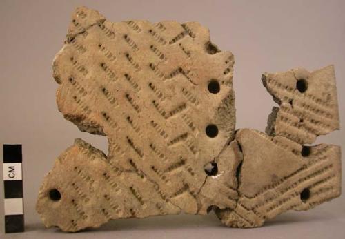 Potsherd-pit and comb ornamented