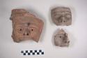 Fragments of terra-cotta heads