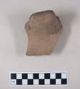 Painted potsherd with lug