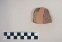 Earthenware vessel body sherd with polychrome painted decoration