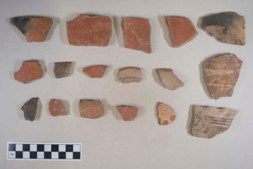 Earthenware vessel sherd; rim and body; all with painted decoration, some red-on-buff, red, poly-chrome, white and red; some burnt