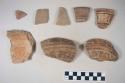 Earthenware vessel sherds; most decorated in polychrome paint designs, some unpainted buff; rim, base, and body sherds