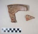 Earthenware vessel rim and body sherds with polychrome decoration; the largest being three previously crossmended fragments
