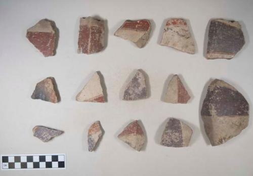 Earthenware vessel sherds with poly chrome decoration; some with corner edges