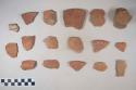 Earthenware vessel sherds; most painted red, some polychrome; most body sherds, some rim, some lug handle, one hollow round pode.
