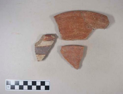 Earthenware vessel rim sherds with red paint exterior decoration; one with polychrome