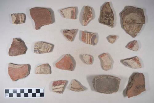 Earthenware vessel sherds; some rim, body, and base sherds; some with red paint decoration exterior, some polychrome, some red on buff.