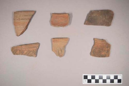 Miscellaneous potsherds & one whistle