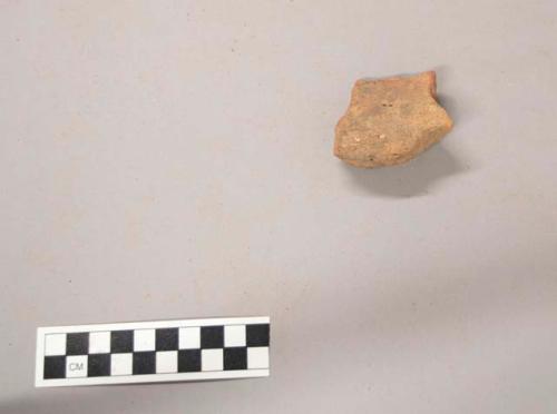 Pottery briquette fragment