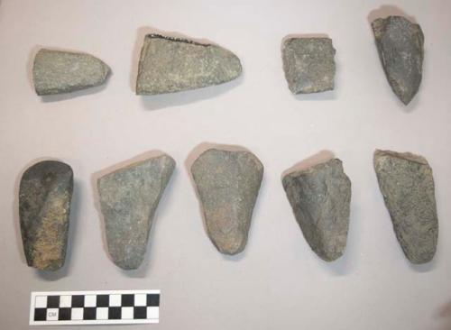 8 chipped stone celts