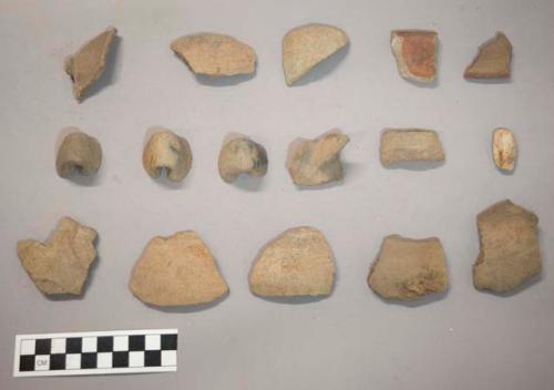 Brown pottery jar, loop handles, and other sherds