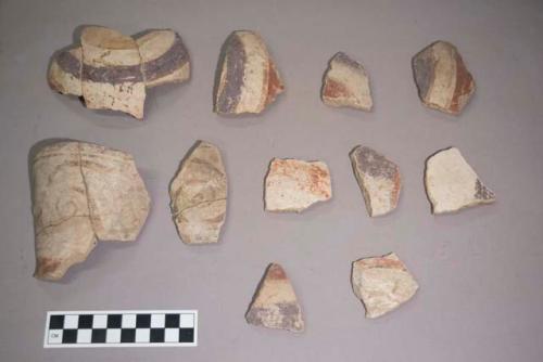 Earthenware vessel base, body, and rim sherds. Polychrome (purple, red, brown, gold, etc) decorations.