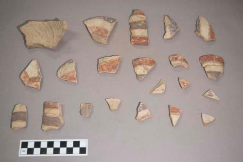 Earthenware vessel rim, body, and base sherds. Polychrome decorated.