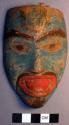 Painted wooden miniature mask