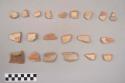 Earthenware vessel rim, body sherds. Some with red painted exterior, some with white painted exterior, some with red on white painted decoration.