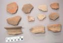 Earthenware vessel rim, base, and body sherds. Most with polychrome exterior and red interior decoration. Some with red on white painted decoration.One footed base sherds and several wide flared rim sherds. Some incised. One with modeled anthromorphic figure.