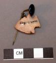Arrow head of chert? mounted by chain to a stickpin