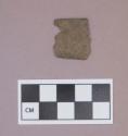 Metal, copper alloy sheet fragment, folded edges