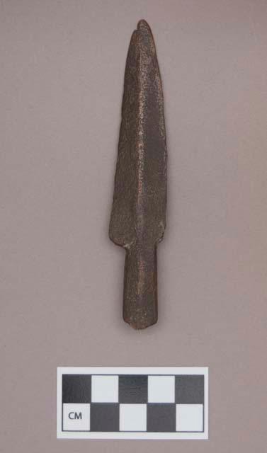 Metal, copper alloy projectile point, with rolled stem